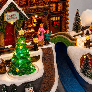 LED Christmas Reindeer Lodge Snow Scene with Movement and Music, 35cm Wide