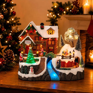 LED Christmas Reindeer Lodge Snow Scene with Movement and Music, 35cm Wide