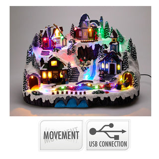 LED Christmas Village with Moving Train and Ice Skaters, Snowy Winter Scene